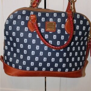 Dooney & Bourke Navy Monogram Satchel with Brown Trim and Red Braided Handles